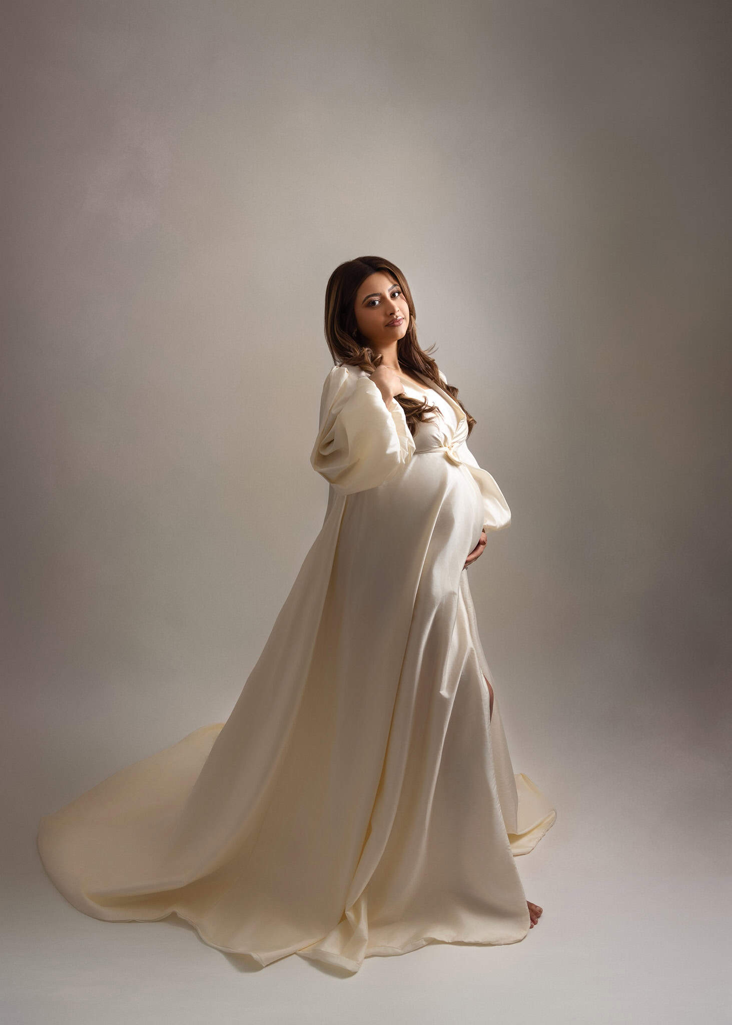 Glowing mother laughing during maternity shoot – Edmonton pregnancy photography