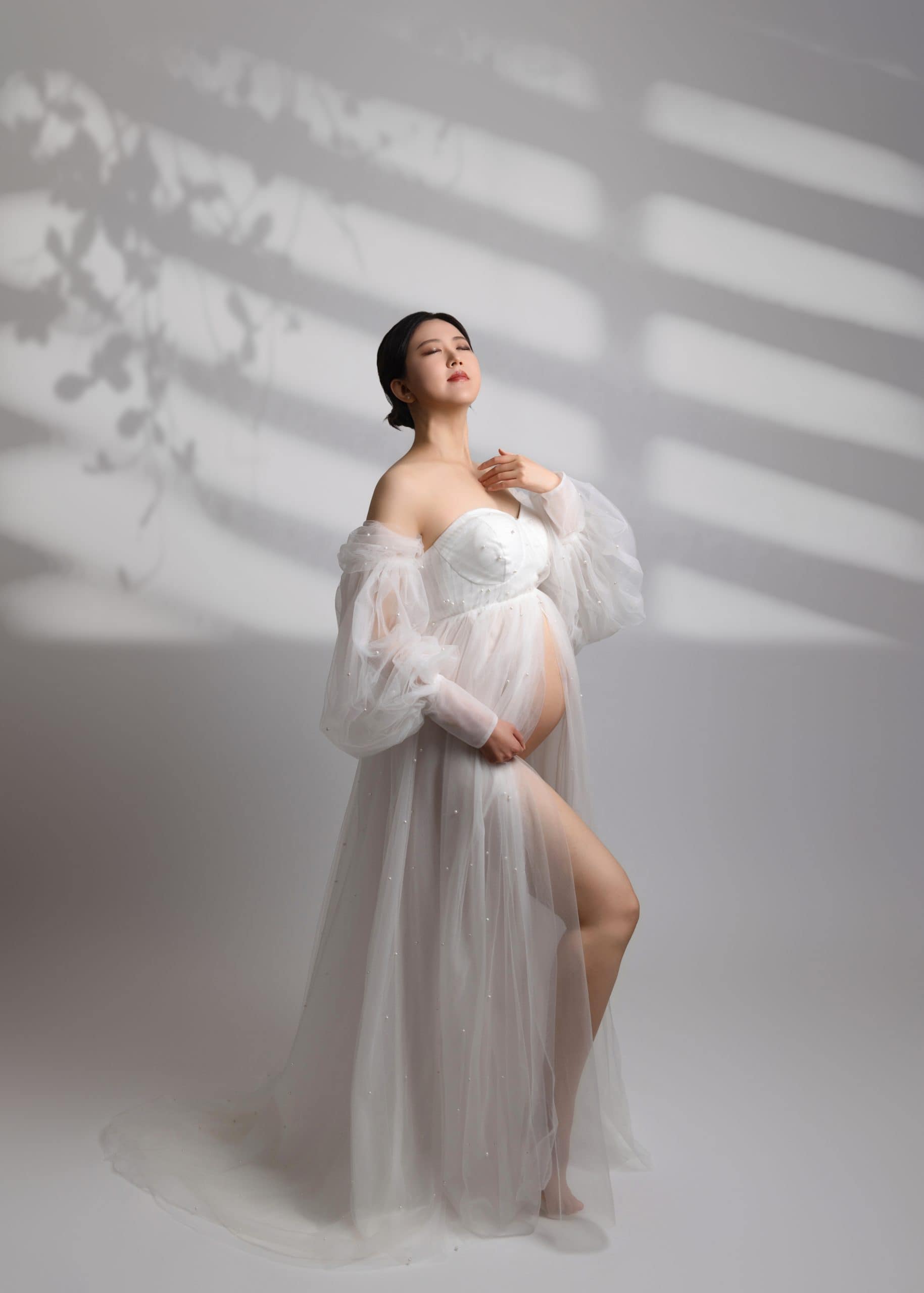 Classic and timeless maternity photo taken in Edmonton Studio