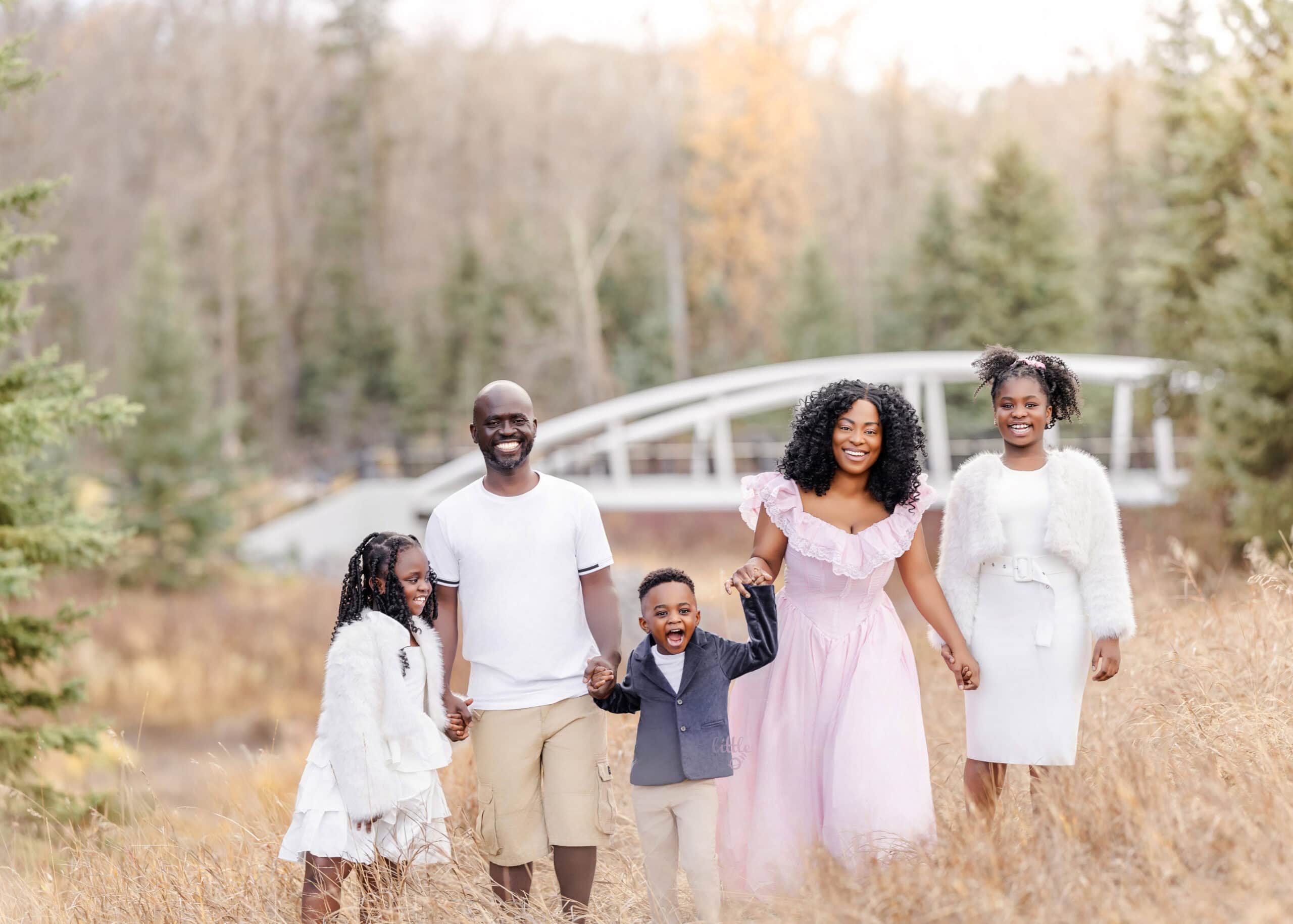Edmonton family photoshoot during the fall, kids and parents walking together