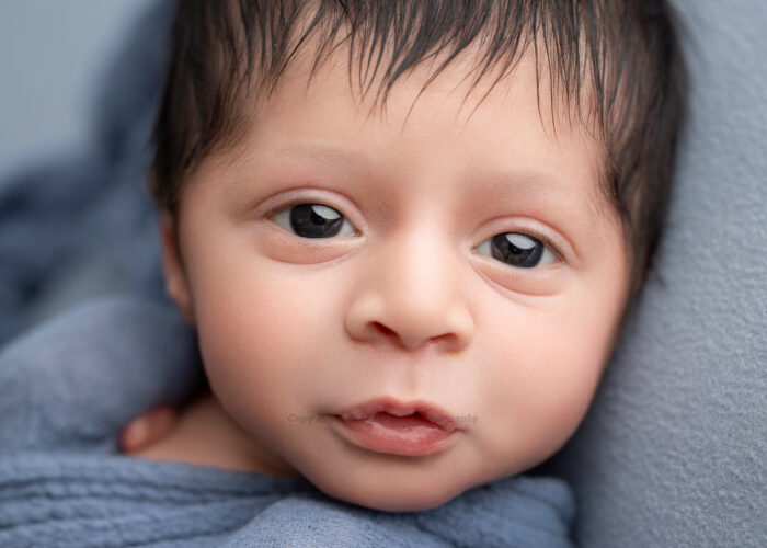 newborn baby close up photoshoot with baby eyes open